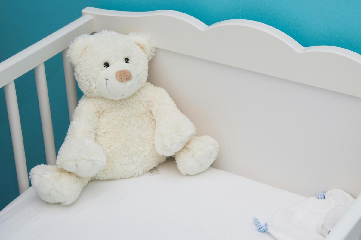 LambertMovingBaby(1200px) Teddy bear in crib